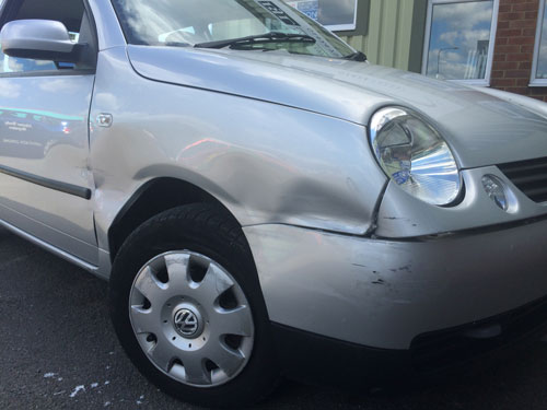 Damaged-Silver-Car