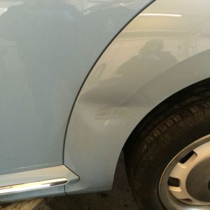 Car-With-Dented-Wheel-Arch